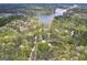 An aerial view displaying property lines in a wooded area near Lake Dow at 173 Darwish Dr, Mcdonough, GA 30252
