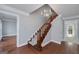Elegant foyer with staircase and chandelier lighting at 173 Darwish Dr, Mcdonough, GA 30252