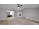 Main bedroom featuring an ensuite bathroom and fireplace access at 173 Darwish Dr, Mcdonough, GA 30252
