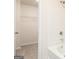Bathtub and shower with white subway tile at 295 Limestone Circle, Conyers, GA 30013
