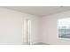 Bedroom featuring neutral carpet and a door that leads into a bathroom at 295 Limestone Circle, Conyers, GA 30013