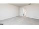 Bedroom featuring neutral carpet, a window, and an interior door at 295 Limestone Circle, Conyers, GA 30013
