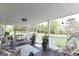 Covered front porch with swing, seating and garden views is perfect for relaxation at 395 Moss Ferry Rd, Villa Rica, GA 30180