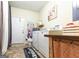 Functional laundry room includes a washer, dryer, and storage space, ideal for efficient chores at 395 Moss Ferry Rd, Villa Rica, GA 30180