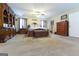 Spacious main bedroom with ample natural light, neutral carpeting and plenty of space for furniture at 395 Moss Ferry Rd, Villa Rica, GA 30180