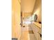 Bathroom featuring bathtub, a double vanity, and a shower enclosure at 108 Stonecrest Dr, Carrollton, GA 30116