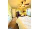Bedroom with four poster bed, ceiling fan and decor at 108 Stonecrest Dr, Carrollton, GA 30116