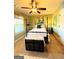 Bedroom with ceiling fan and natural light with a four poster bed at 108 Stonecrest Dr, Carrollton, GA 30116