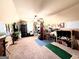 Spacious bonus room with high ceilings, ceiling fan, and ample storage, perfect for hobbies or a home office at 108 Stonecrest Dr, Carrollton, GA 30116