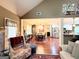 Spacious living room with hardwood floors, a fireplace, and an open layout perfect for entertaining at 108 Stonecrest Dr, Carrollton, GA 30116