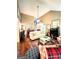 Spacious living room with hardwood floors, a fireplace, and an open layout perfect for entertaining at 108 Stonecrest Dr, Carrollton, GA 30116