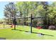 Community playground with swings on synthetic turf at 108 Stonecrest Dr, Carrollton, GA 30116