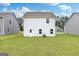 Spacious backyard with a well-maintained lawn, perfect for outdoor activities and relaxation at 307 Limestone Circle, Conyers, GA 30013