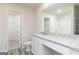 Bathroom features a white vanity with granite countertop and tile flooring at 307 Limestone Circle, Conyers, GA 30013