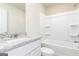 Bright bathroom featuring granite counters, modern fixtures, and a tub-shower combination at 307 Limestone Circle, Conyers, GA 30013