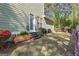 Spacious backyard with a well-maintained lawn, lush greenery, and a charming wooden fence at 217 Christina Ct, Peachtree City, GA 30269