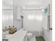 Well-lit bathroom features a single sink vanity, mirrored cabinet and shower curtain at 217 Christina Ct, Peachtree City, GA 30269