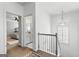 Bright hallway with carpeted floors, access to bedroom, and adjoining bathroom space at 217 Christina Ct, Peachtree City, GA 30269