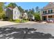 Neighborhood street view featuring well-maintained homes with manicured lawns and mature trees at 217 Christina Ct, Peachtree City, GA 30269