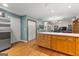 Spacious kitchen with stainless steel appliances, an island with counter seating, and storage at 203 Silverwood Way, Peachtree City, GA 30269