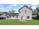 Well-maintained backyard with lush green lawn, and a concrete patio at 2550 Columbia Crossing Ct, Decatur, GA 30034