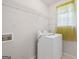 Practical laundry room with a washing machine and shelving at 2550 Columbia Crossing Ct, Decatur, GA 30034