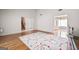 Open-concept living room with hardwood floors and ample natural light at 2550 Columbia Crossing Ct, Decatur, GA 30034