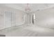 A spacious carpeted main bedroom features a double door closet and ensuite bathroom access at 2550 Columbia Crossing Ct, Decatur, GA 30034