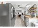Bright, modern kitchen with stainless steel appliances, wood countertops and backyard views at 608 E Banks Rd, Fayetteville, GA 30214