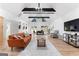 Spacious living room with vaulted ceilings, wood floors, and a view to the outdoors at 608 E Banks Rd, Fayetteville, GA 30214