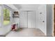 Bright pantry area with tile floors, closet and view to the backyard at 608 E Banks Rd, Fayetteville, GA 30214