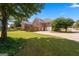 A spacious backyard with green grass, a wooden fence and plenty of room to enjoy outdoor activities at 103 Wisteria Way, Stockbridge, GA 30281
