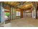 Walkout basement with exposed ceiling, unfinished; offers potential for customization and extra living space at 103 Wisteria Way, Stockbridge, GA 30281