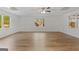 Open basement featuring bright lighting, laminate flooring, and large windows overlooking the outdoors at 103 Wisteria Way, Stockbridge, GA 30281