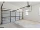 Spacious two-car garage with an automatic door opener, providing convenient and secure parking at 185 Cold Harbor Ct, Sharpsburg, GA 30277
