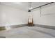 Clean garage featuring steps into the house, offering a practical and organized space at 185 Cold Harbor Ct, Sharpsburg, GA 30277