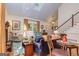 Bright living room featuring a fireplace, hardwood floors, and a staircase at 230 Haynes Rd, Moreland, GA 30259
