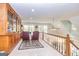 Sitting room with custom cabinets and multiple windows offering ample natural light at 230 Haynes Rd, Moreland, GA 30259