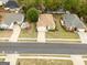 Aerial view of a well-maintained home, surrounded by landscaping in a friendly neighborhood at 210 Brittany Chase, Fayetteville, GA 30214