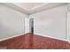 Spacious bedroom featuring wood floors, neutral paint, and a vaulted ceiling at 210 Brittany Chase, Fayetteville, GA 30214