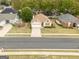 Well-maintained home with manicured lawn, mature trees, and inviting curb appeal in a quiet neighborhood at 210 Brittany Chase, Fayetteville, GA 30214