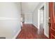 Inviting foyer showcasing wood-look floors and neutral paint, leading to the main living spaces at 210 Brittany Chase, Fayetteville, GA 30214