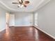 Bright main bedroom featuring hard wood floors, neutral walls, and large windows at 210 Brittany Chase, Fayetteville, GA 30214