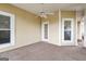 Relax and enjoy the outdoors on this covered porch with carpet and ceiling fan at 210 Brittany Chase, Fayetteville, GA 30214