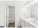 Bathroom with double sink vanity and a separate toilet and shower area at 7260 Eton Ln, Locust Grove, GA 30248