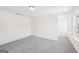 Bedroom with neutral carpet, white walls and a bright and airy atmosphere at 7260 Eton Ln, Locust Grove, GA 30248