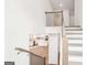 Entryway with staircase and view of the kitchen and living area at 7260 Eton Ln, Locust Grove, GA 30248