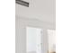 Bright room with modern duct, white walls, and doorways for seamless transitions at 7260 Eton Ln, Locust Grove, GA 30248