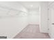 Walk-in closet with carpet and wire shelving for plenty of storage at 7260 Eton Ln, Locust Grove, GA 30248
