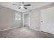 Bedroom with a ceiling fan, new carpet, fresh paint, and a spacious closet at 3387 Oak Dr, Lawrenceville, GA 30044